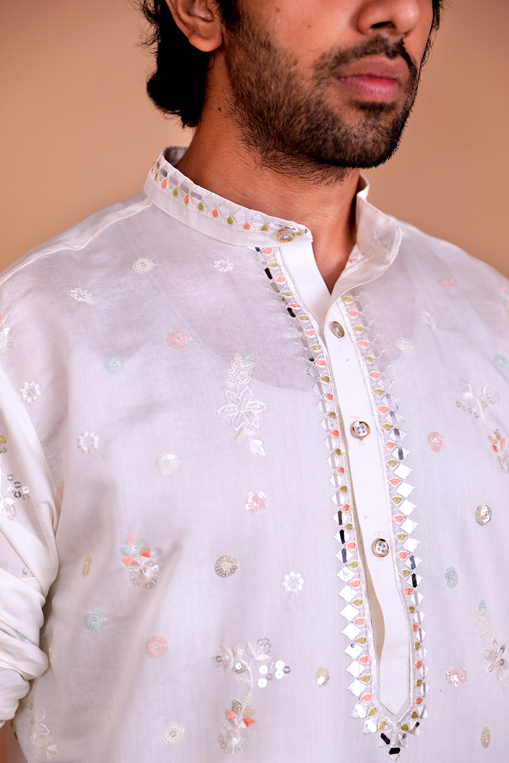 Men Ivory Doli Motif Embroidered Kurta